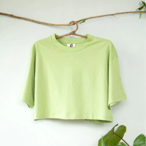 Peace Crop Top A relaxed boxy crop top with a small pocket detail on the sleeve upcycled organic cotton